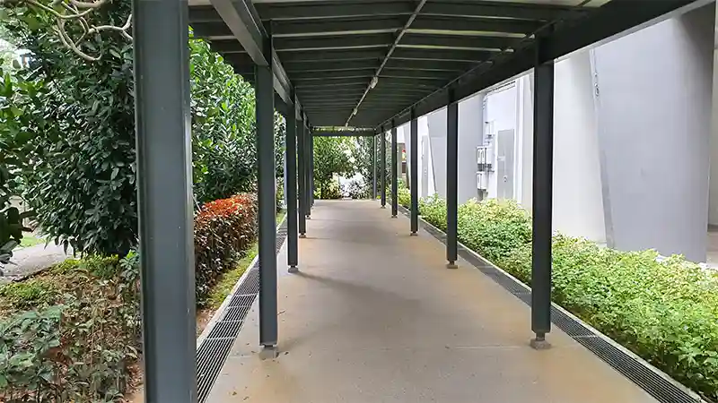Sheltered linkway and bus stop at Depot Heights